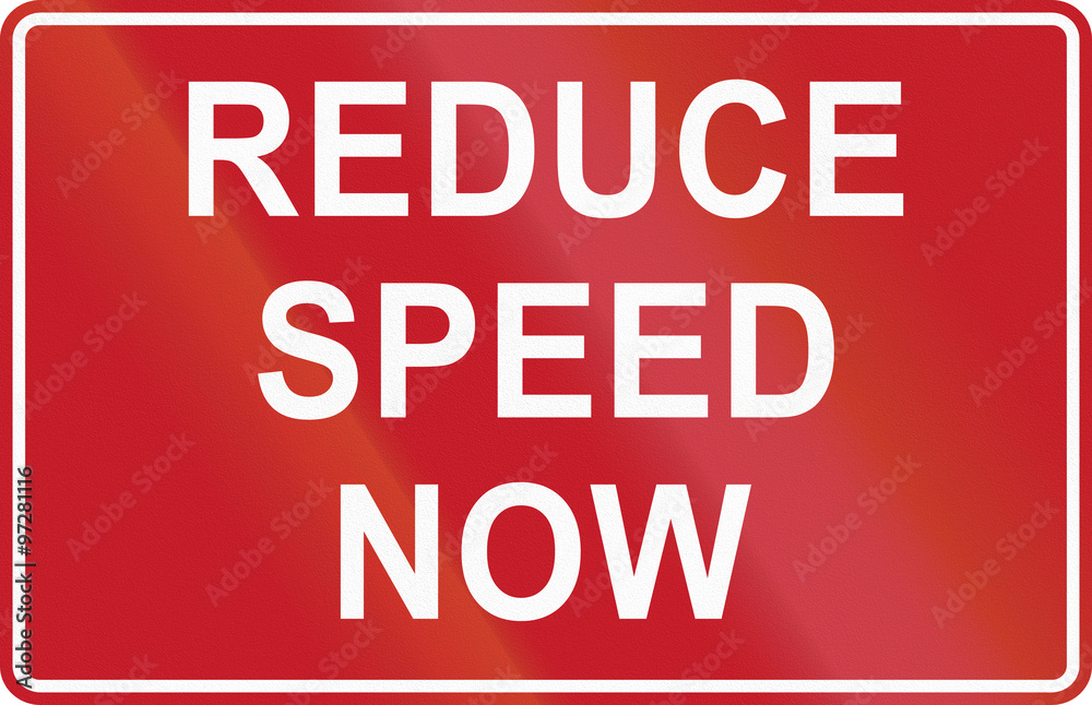 Road sign in the Philippines - Reduce Speed Now