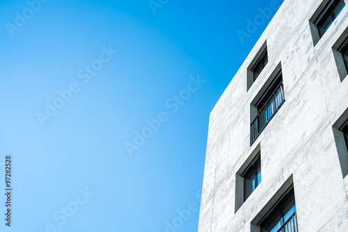 concrete facade of a building with windows