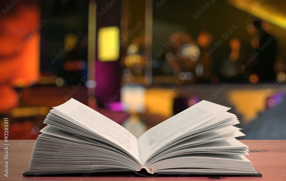 Obraz premium book on the table in a club