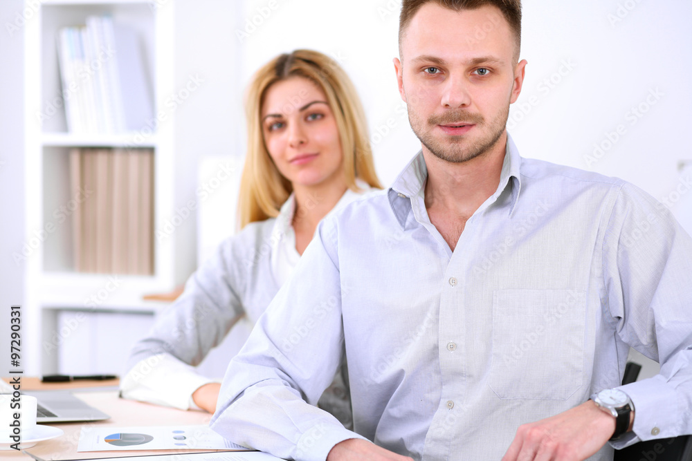 Two successful business partners working at meeting in office Two successful business partners working at meeting in office