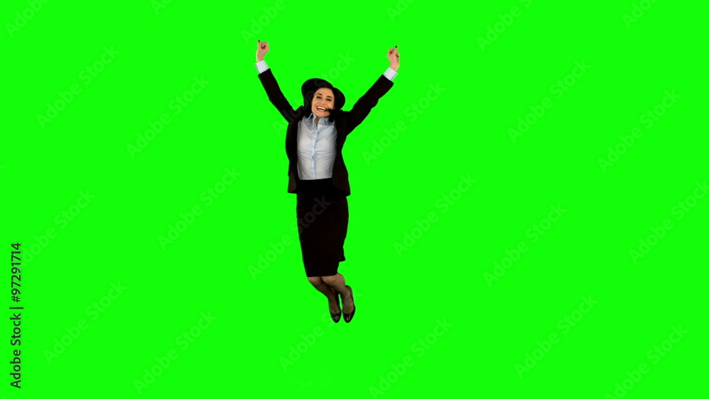Businesswoman jumping on green screen Businesswoman jumping on green screen