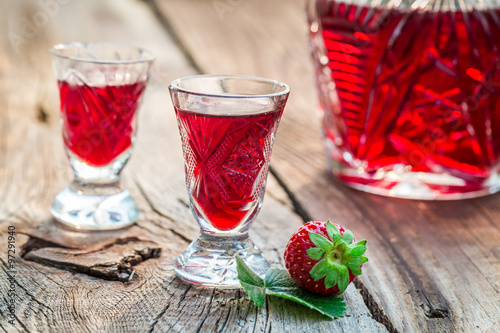 Fresh liqueur with strawberries and alcohol photo