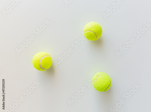 close up of three yellow tennis balls © Syda Productions