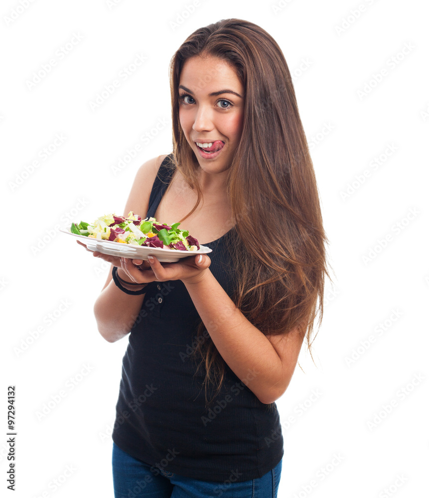portrait of a young woman holding a delicious salad portrait of a young woman holding a delicious salad
