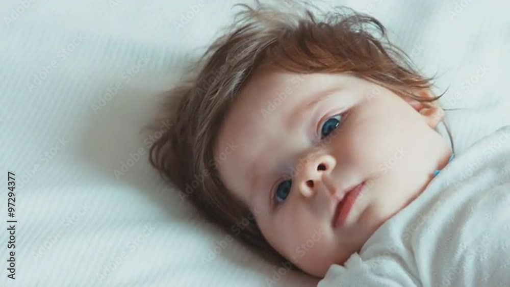 Closeup portrait of newborn baby smiling Closeup portrait of newborn baby smiling
