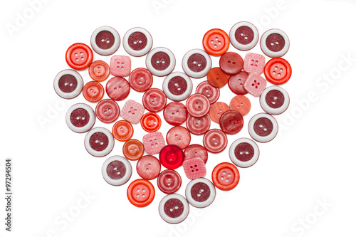 symbol heart made of buttons on white