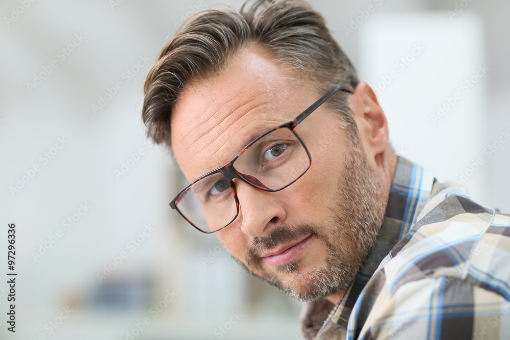 Portrait of handsome 40-year-old man with eyeglasses Portrait of handsome 40-year-old man with eyeglasses