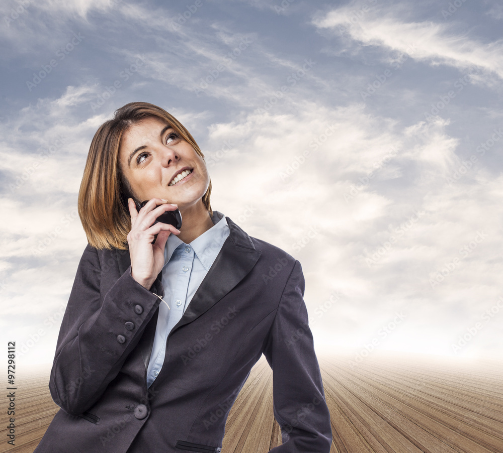 portrait of a business young woman talking on telephone portrait of a business young woman talking on telephone