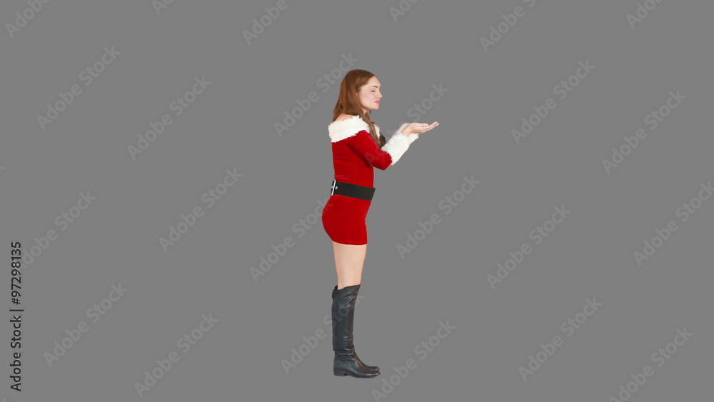 Christmas girl walking and blowing kiss Christmas girl walking and blowing kiss