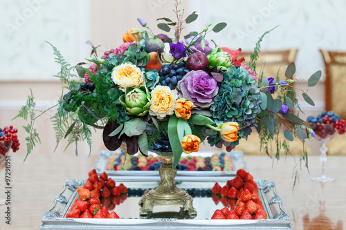 Serving on the table restaurant catering elegant floral arrangement wedding