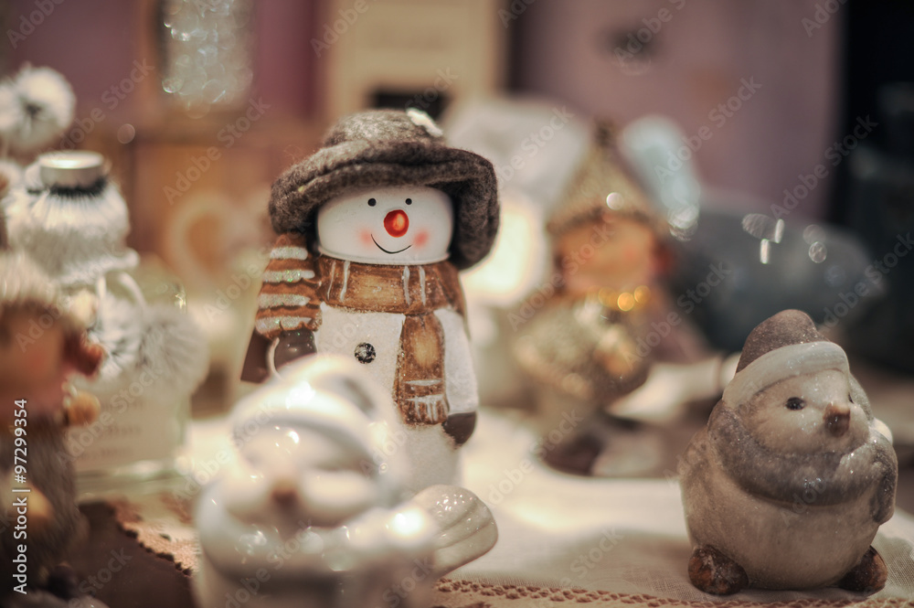 Snowman with scarf and hat.