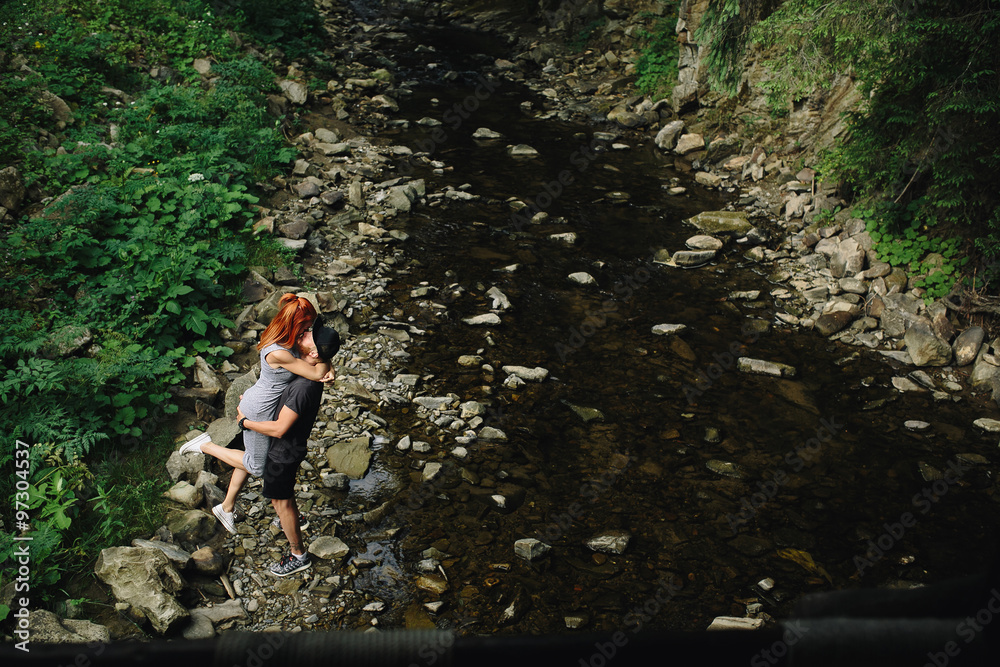 beautiful couple on the background of forest