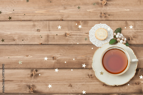 Cup Of Tea. Mince Pie. Shining Stars. Wooden Background With Cop