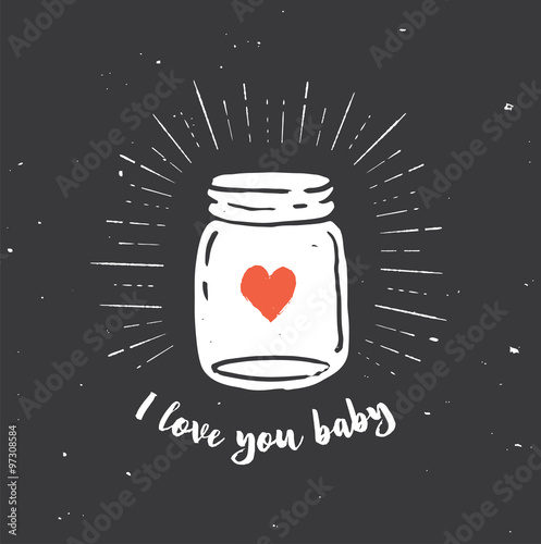 mason jar with heart, love quote on the black chalkboard