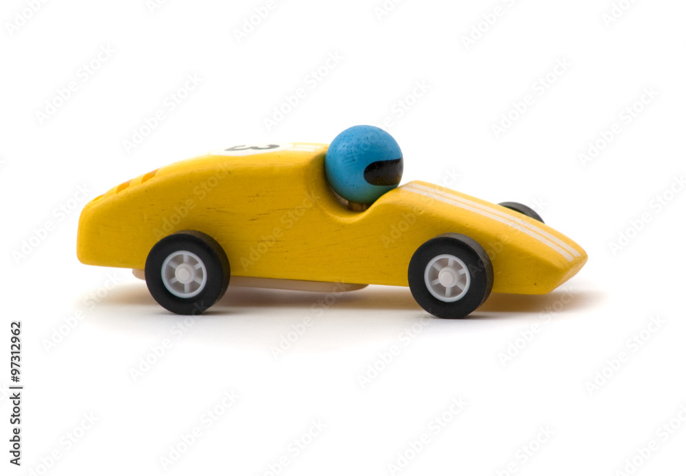 yellow racing toy car on white background