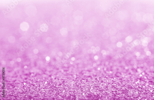 Pink defocused glitter background.