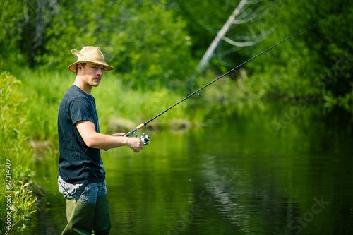 Young Fisherman Fishing with Patience