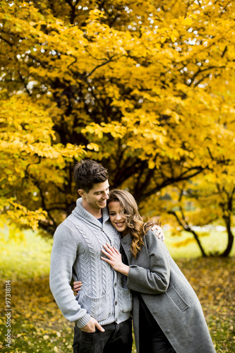 Young couple in the autumn park