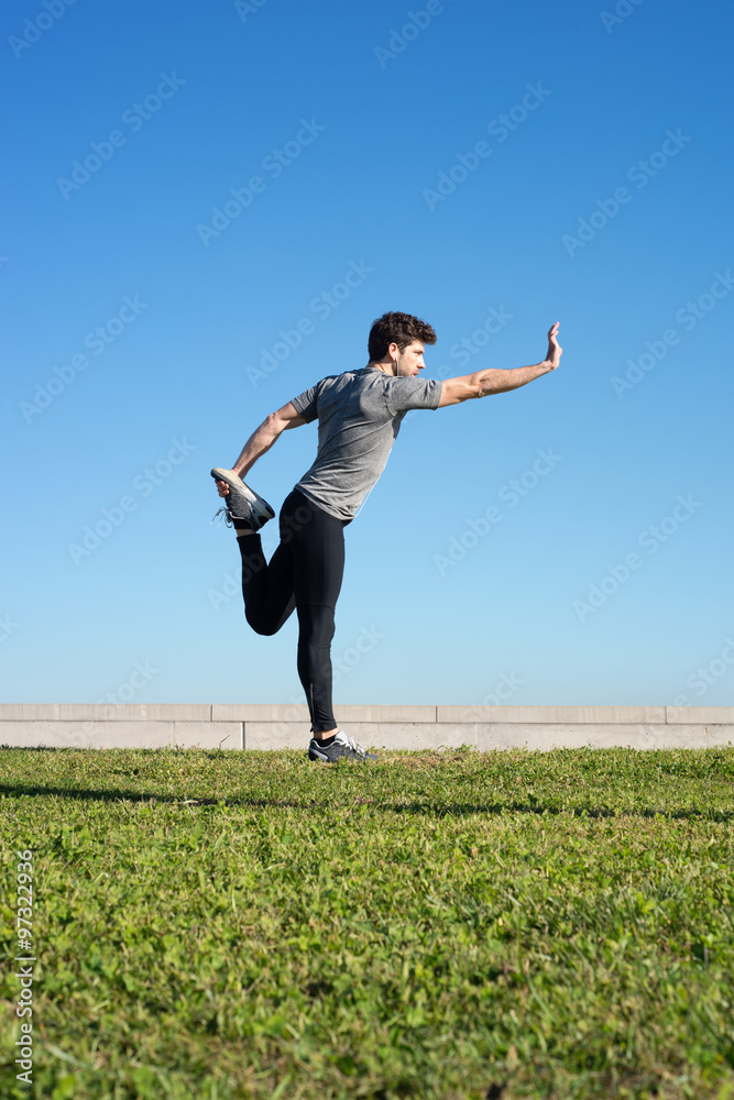 man stretches the body before running space for text down man stretches the body before running space for text down