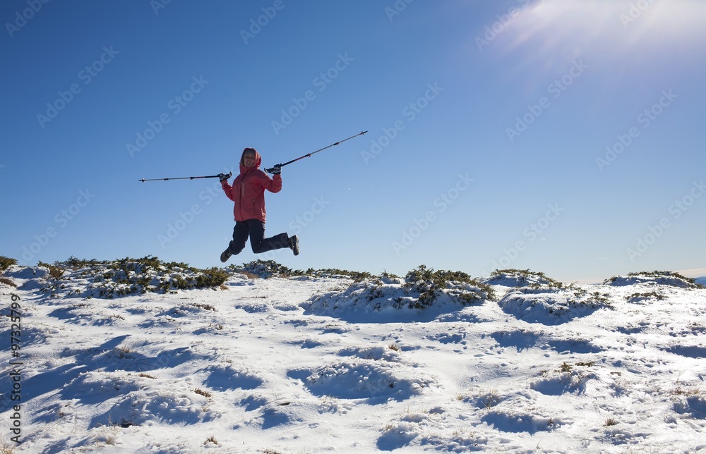 Young and beautiful girl in the mountains.