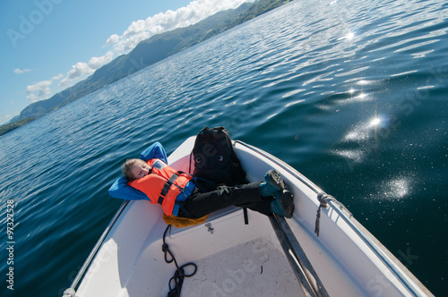 Lying goril in a boat photo