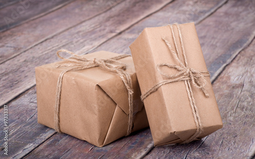 Brown Gift Boxes on a Rustic Wooden Surface