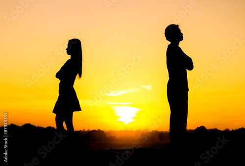 Silhouette of a angry woman and man on each other / Relationship difficulties / Couple break up