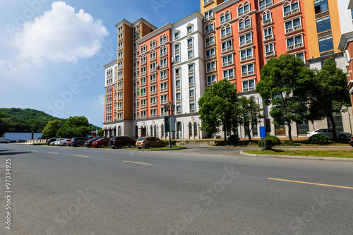 New apartment building in suburban area © ABCDstock