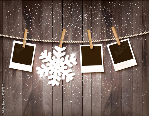 Christmas background with photos and a snowflake. Vector.