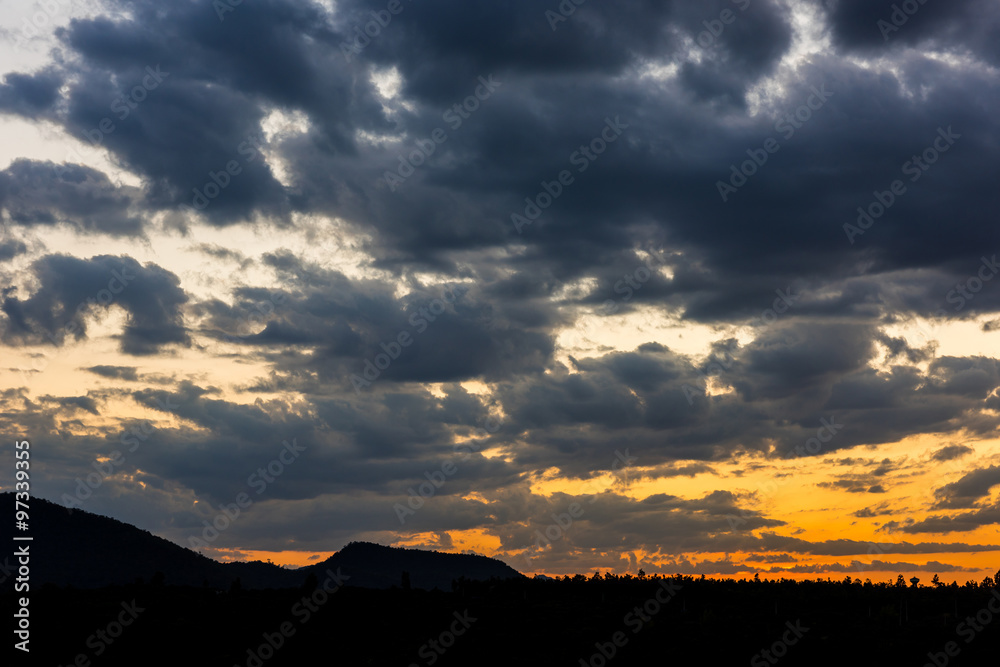 Colorful sunset over the mountain hills