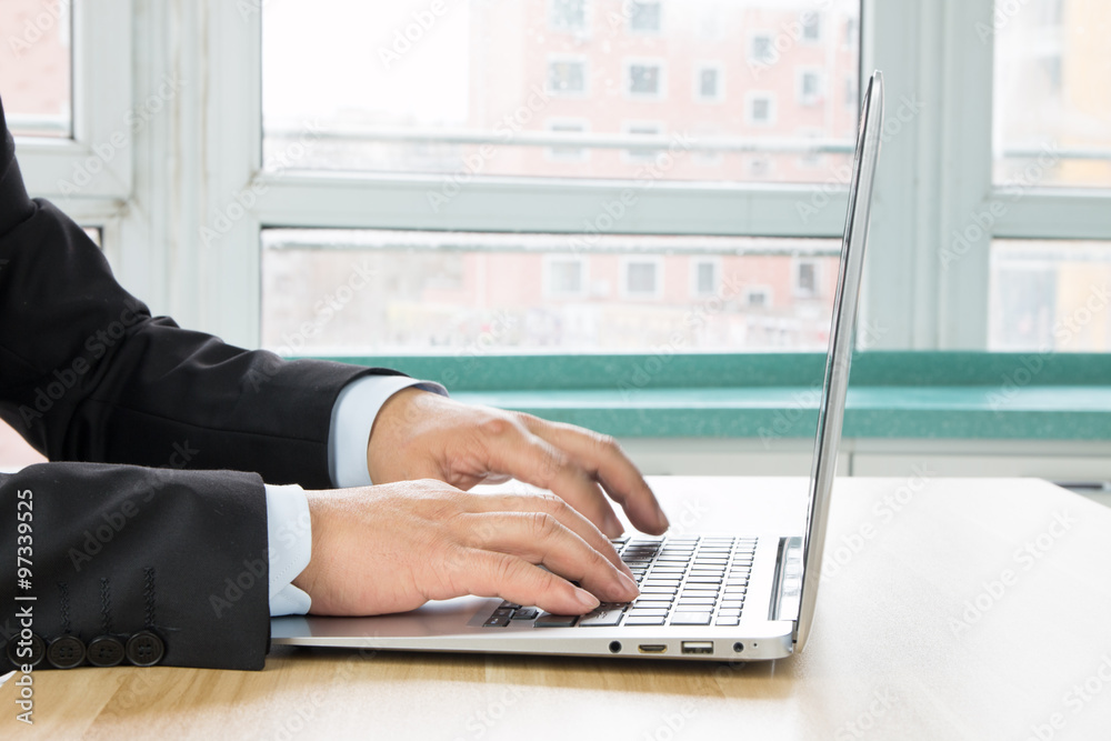 Businessman using laptop at work Businessman using laptop at work
