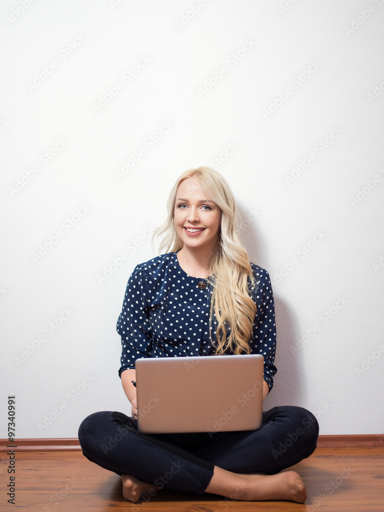 young beautiful woman using a laptop computer at home young beautiful woman using a laptop computer at home