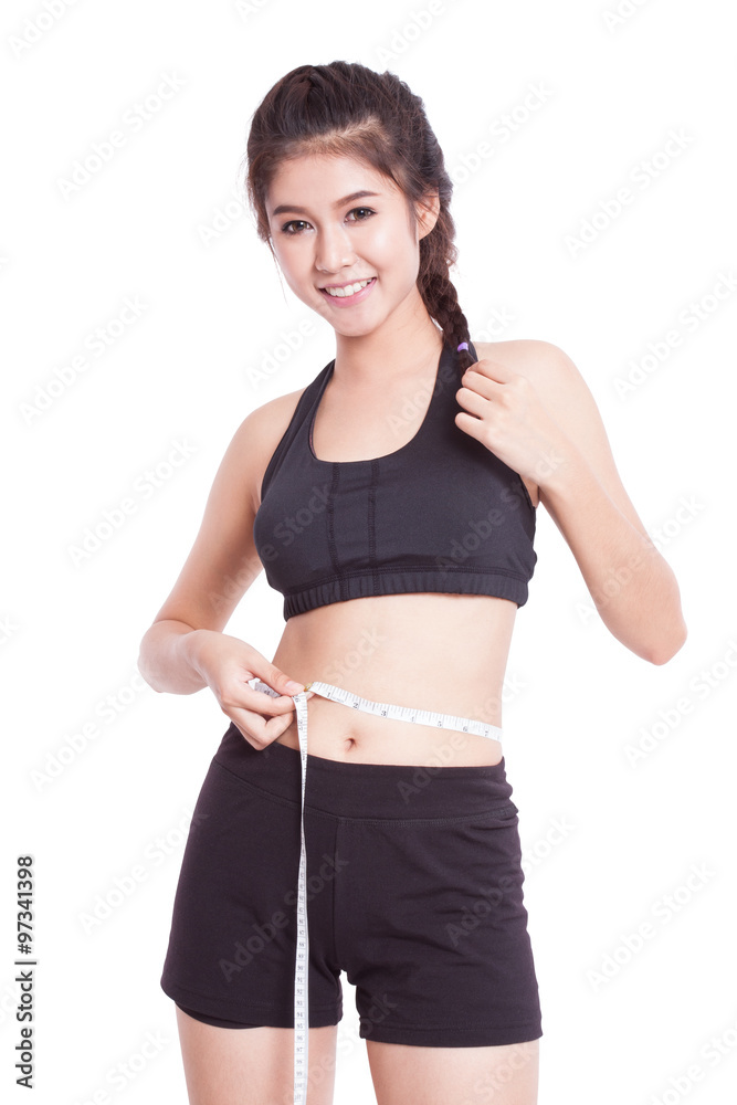 Fitness young woman taking measurements of her body. healthy concept Fitness young woman taking measurements of her body. healthy concept