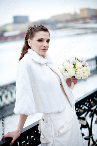 Bride in winter snow city