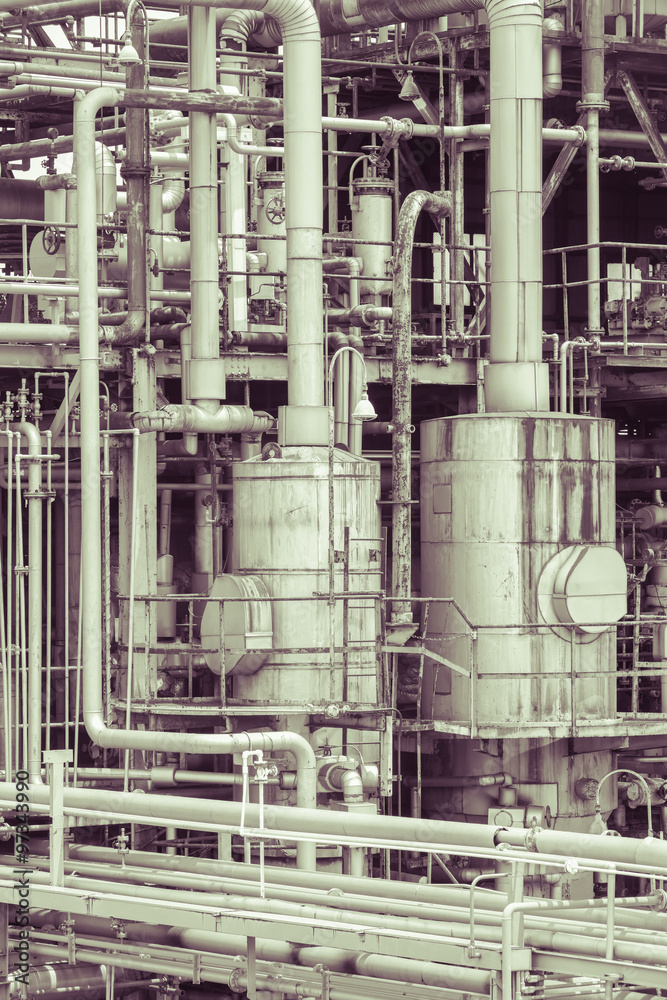 Close - up Oil refinery plant detail  in vintage tone edit