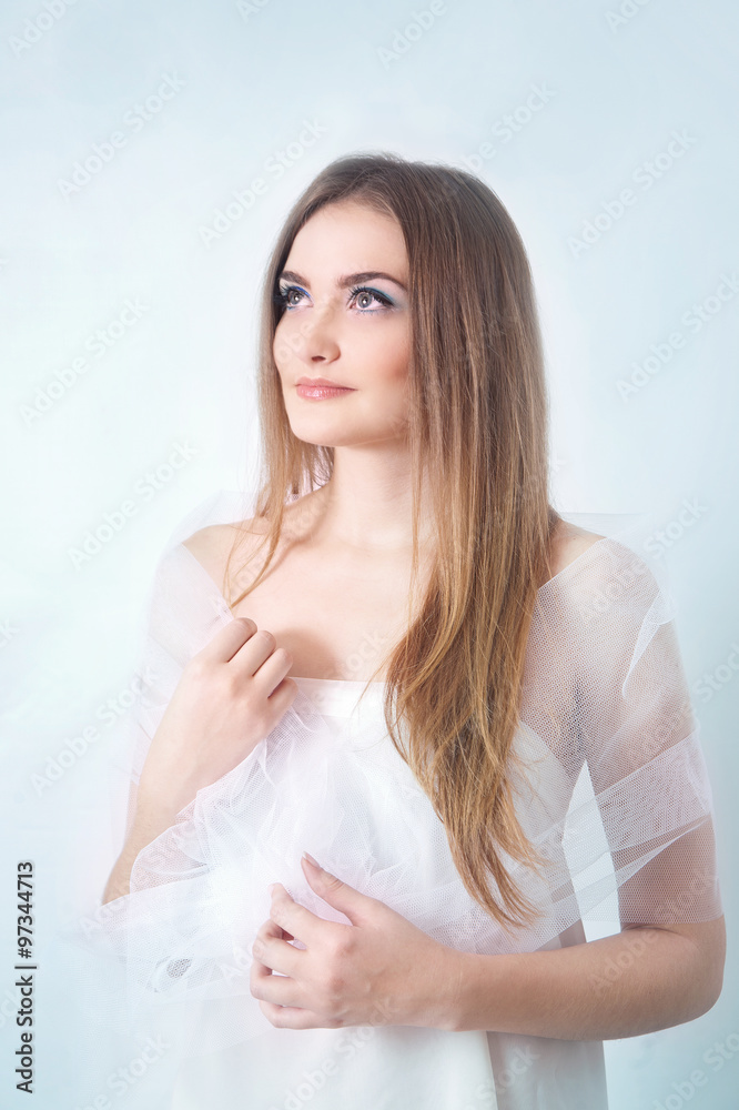 Portrait of a beautiful young woman looking up Portrait of a beautiful young woman looking up