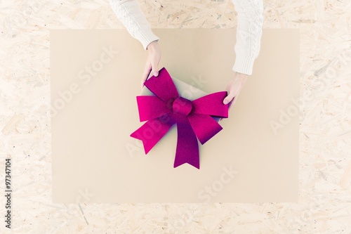 Pink bow on table