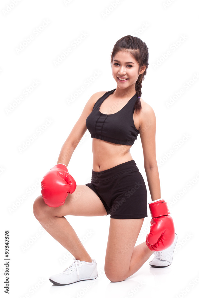 Fitness woman with the red boxing gloves Fitness woman with the red boxing gloves