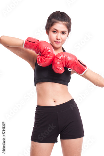 Boxer - Portrait of fitness woman boxing wearing boxing red gloves on white background. © japhoto