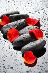 Spa stones with rose petals