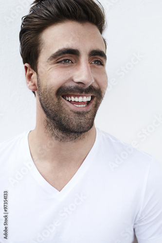 Smiling young man in white t-shirt