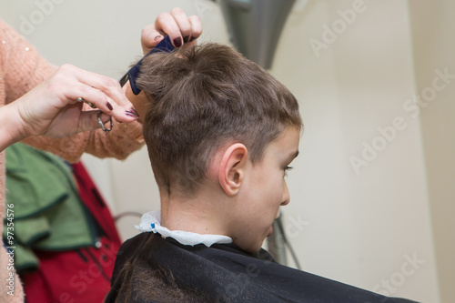 boy at barber , haircut