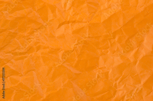 Orange crumpled paper for texture or background.