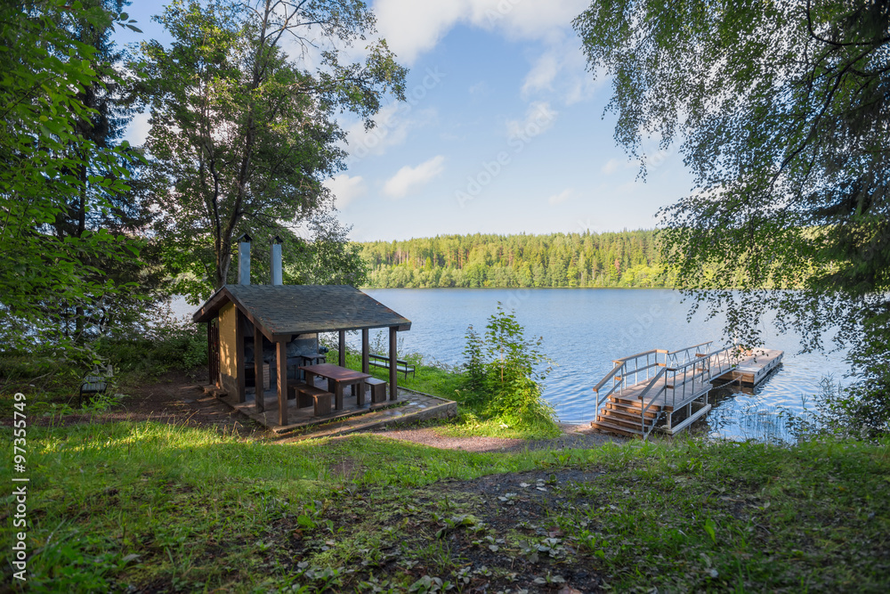 Arbour for rest and meal preparation at the lake in the woods Arbour for rest and meal preparation at the lake in the woods