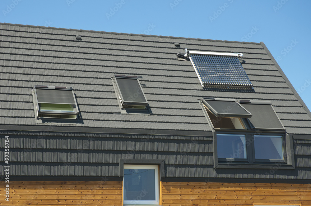 Closeup of Solar Water Panel Heating, Dormers, Solar Panels, Skylights, Ventilation and Air