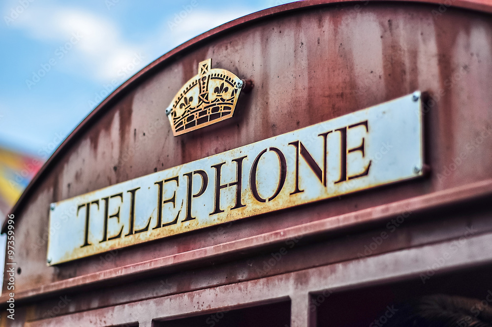 Close up of the top of a classic redTelephone box.