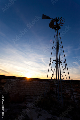 Texas wind pump sunset