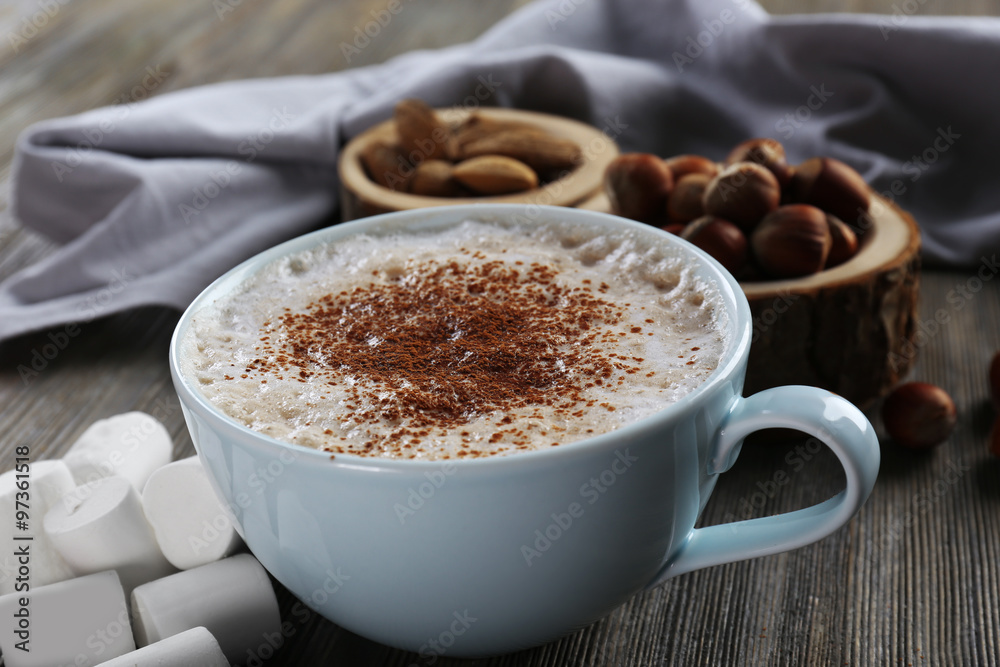Cup of hot cacao with marshmallow on wooden background, close up Cup of hot cacao with marshmallow on wooden background, close up