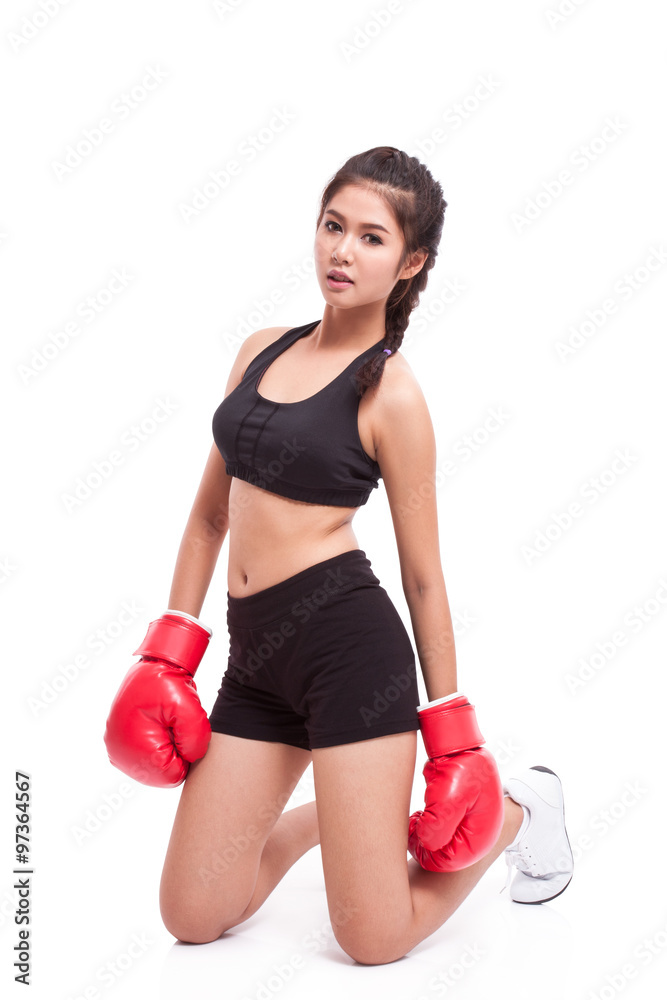 Boxer - Full length fitness woman boxing wearing boxing gloves on white background. Boxer - Full length fitness woman boxing wearing boxing gloves on white background.
