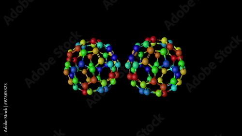 Two Buckminster fullerene molecules spinning photo